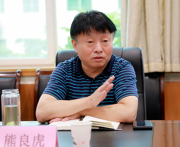 熊良虎拜会渭南市生态情形局党委书记、、局长左俊